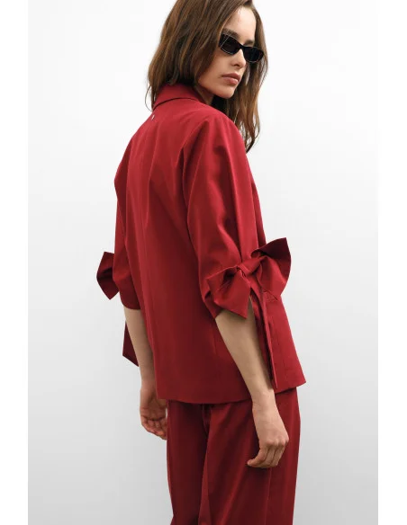 Blazer à manches bouffantes et fermeture à deux boutons Please