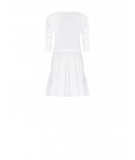 Short two-piece outfit with a ruffled cotton A-line skirt and a Rinascimento-style crochet top