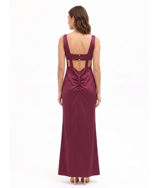 Rinascimento-style long dress in structured satin, with a low neckline and gathered at the back