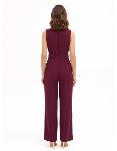 Cadi fabric jumpsuit with a pleated neckline, matching stiff belt a...