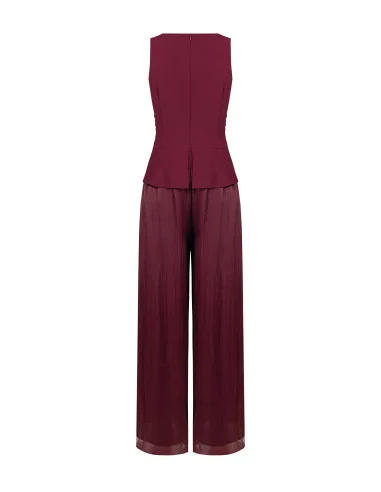 Palazzo-style jumpsuit in laminated satin with a bodice in flowing ‘Rinascimento’ fabric