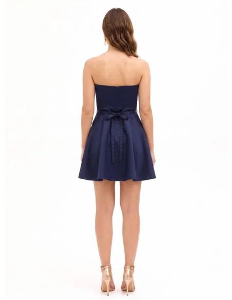 Short, flared dress with a Rinascimento-style rhinestone jewelled belt