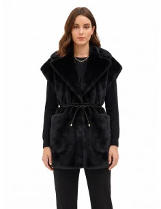 Long, sleeveless waistcoat in soft faux fur with a faux leather belt and ‘Rinascimento’ pockets