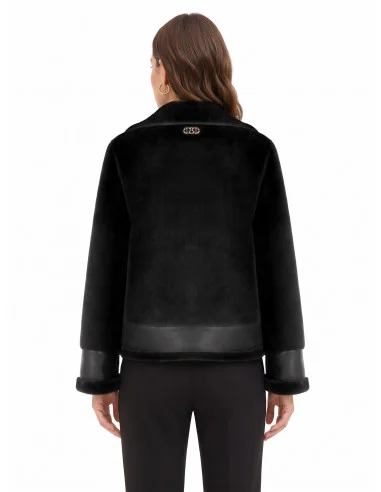 Short faux fur jacket with faux leather detailing and front pockets with gold-coloured zips by Rinascimento