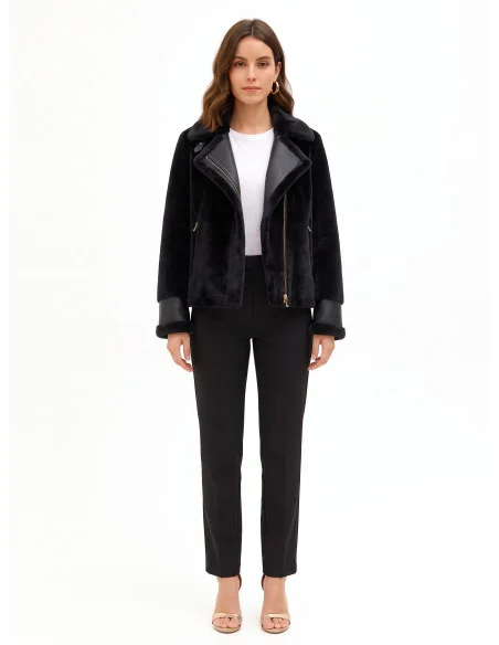 Short faux fur jacket with faux leather detailing and front pockets with gold-coloured zips by Rinascimento