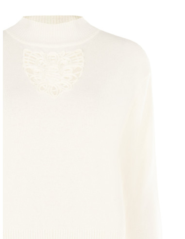 Rinascimento: A lightweight jumper in a viscose and wool blend with a crochet insert at the front