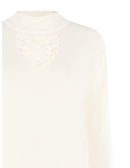 Rinascimento: A lightweight jumper in a viscose and wool blend with a crochet insert at the front