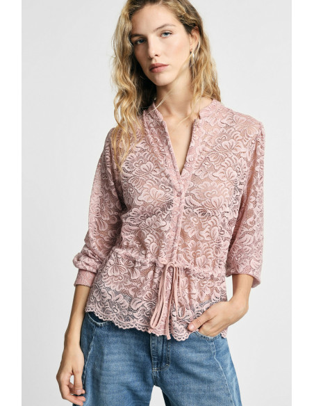 Chemise en dentelle avec cordon de serrage et boutons sur le devant...