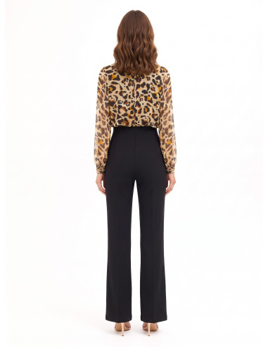Scuba crepe flared-leg jumpsuit with a spotted georgette top and Rinascimento-style lurex drops