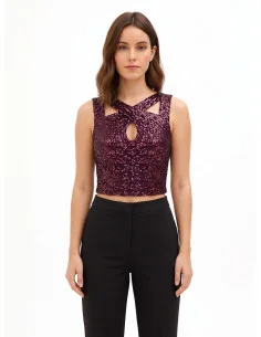 Sequin-covered crop top with Rinascimento-style cut-outs