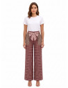 Patchwork-style palazzo trousers with a logoed Rinascimento scarf at the waist