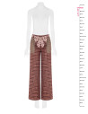 Patchwork-style palazzo trousers with a logoed Rinascimento scarf at the waist