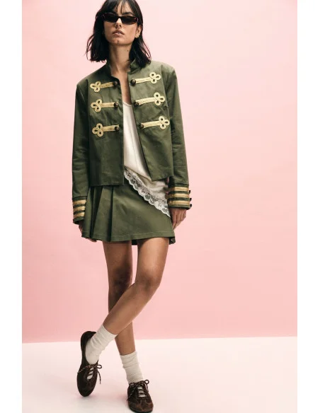 Short Skirt With Pleats And Decorative Buttons Please