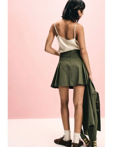 Short Skirt With Pleats And Decorative Buttons Please