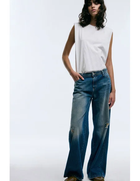 Jeans à jambe large avec détails en tissu Please