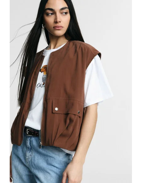 Gilet court avec fermeture éclair et poches frontales Please